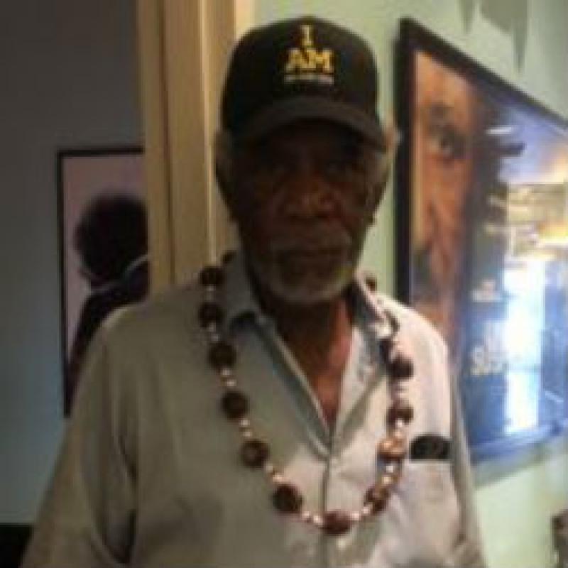 Morgan Freeman wearing buckeye necklace 