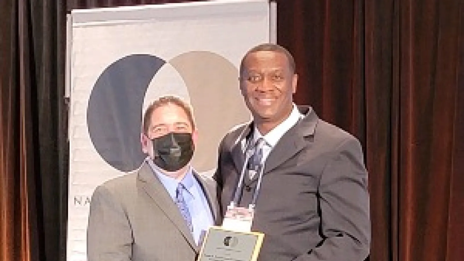 Holt receiving award