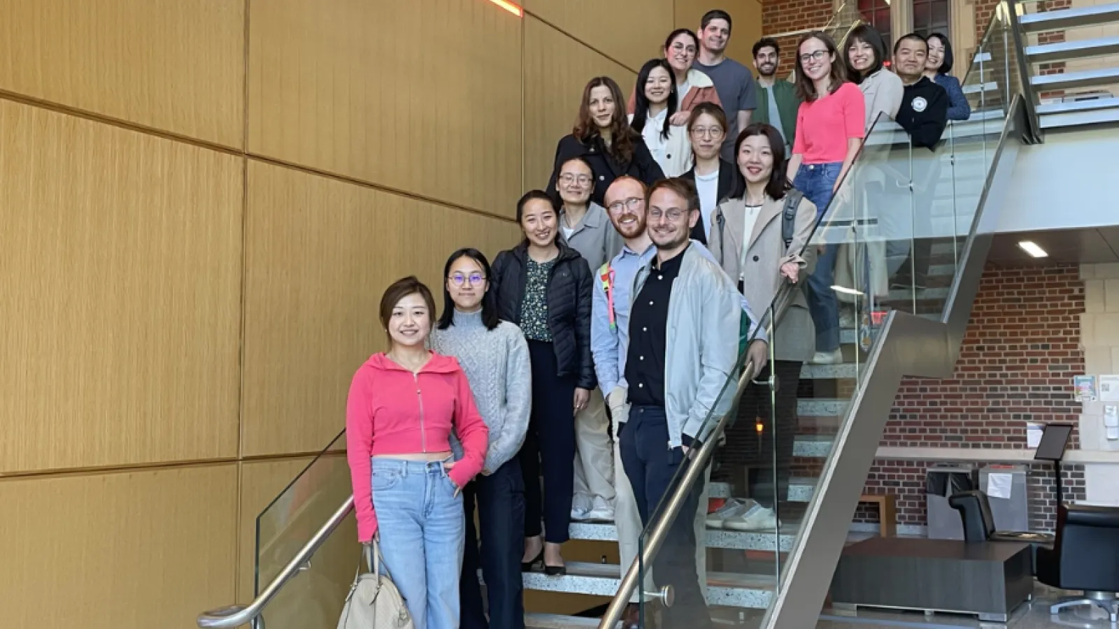 Group photo of graduate students and researchers at the COSMOS mini-conference in April.