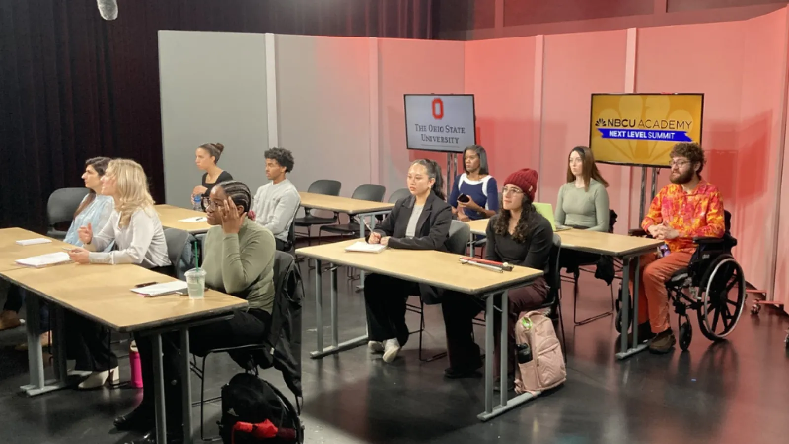 Students pictured participating in simulcast from the front.