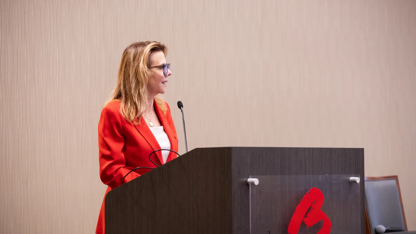 Adrienne Roark speaking at alumni reunion 