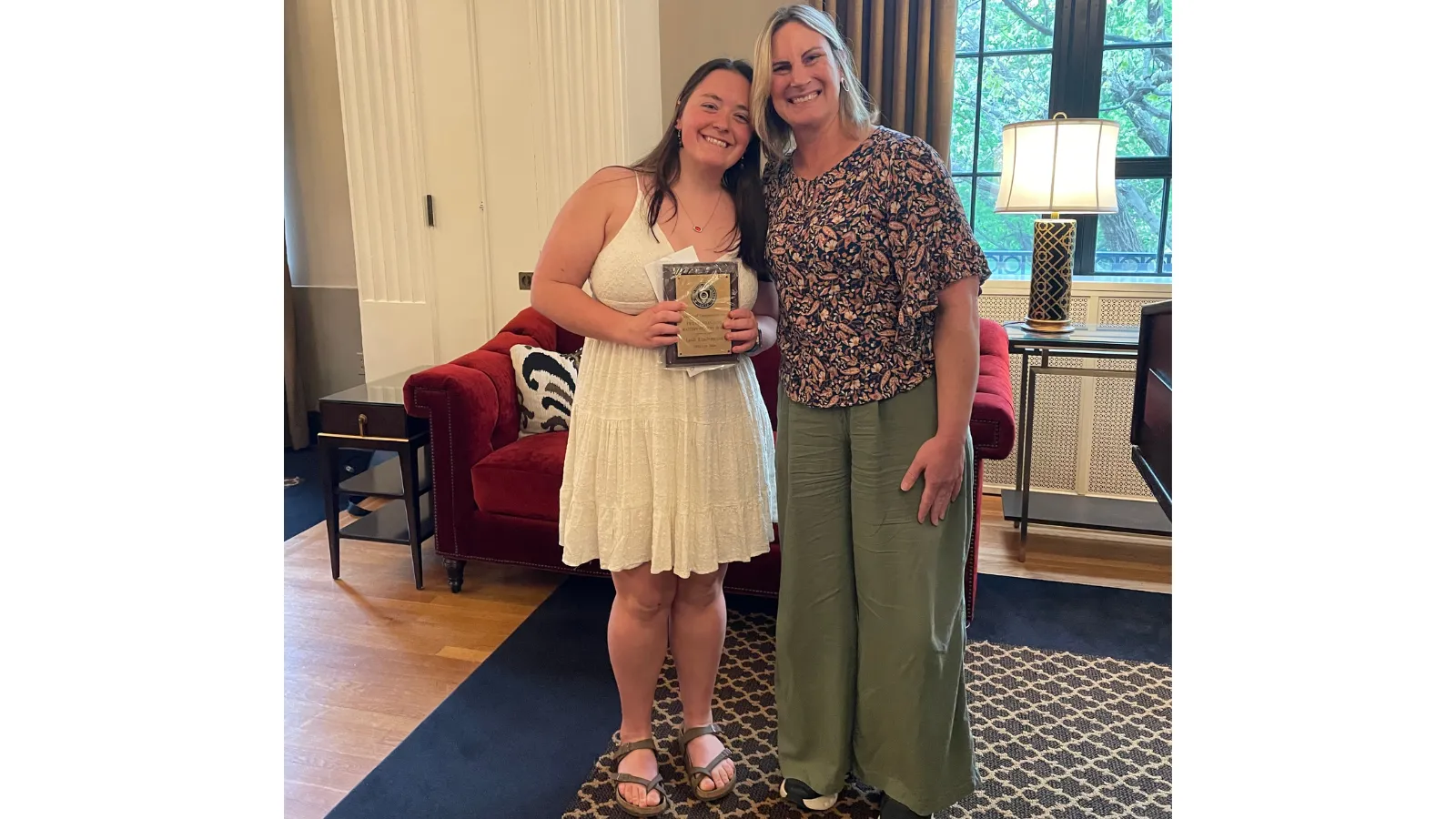 Grad Student and teacher at banquet