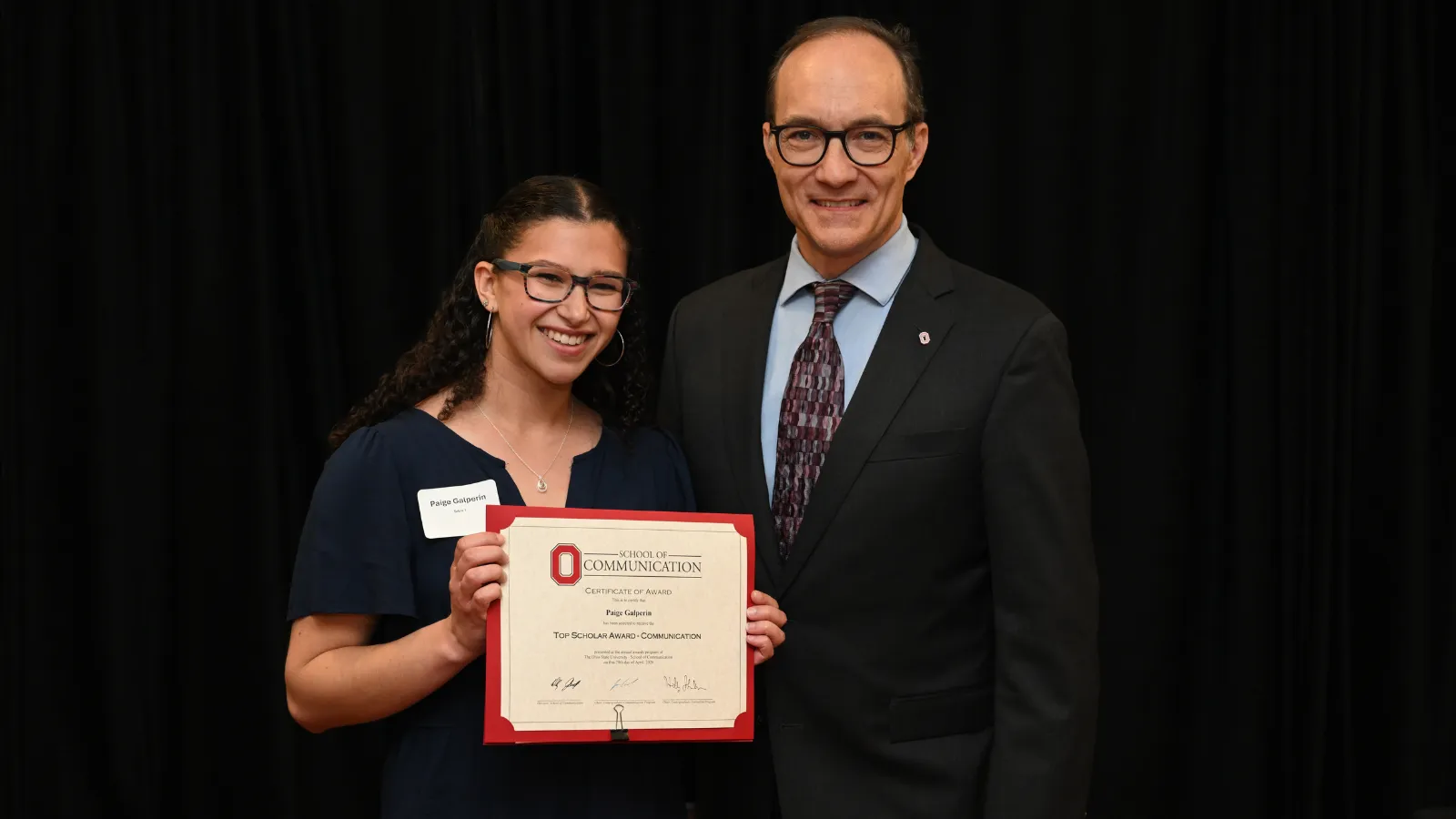 Student and teacher at banquet