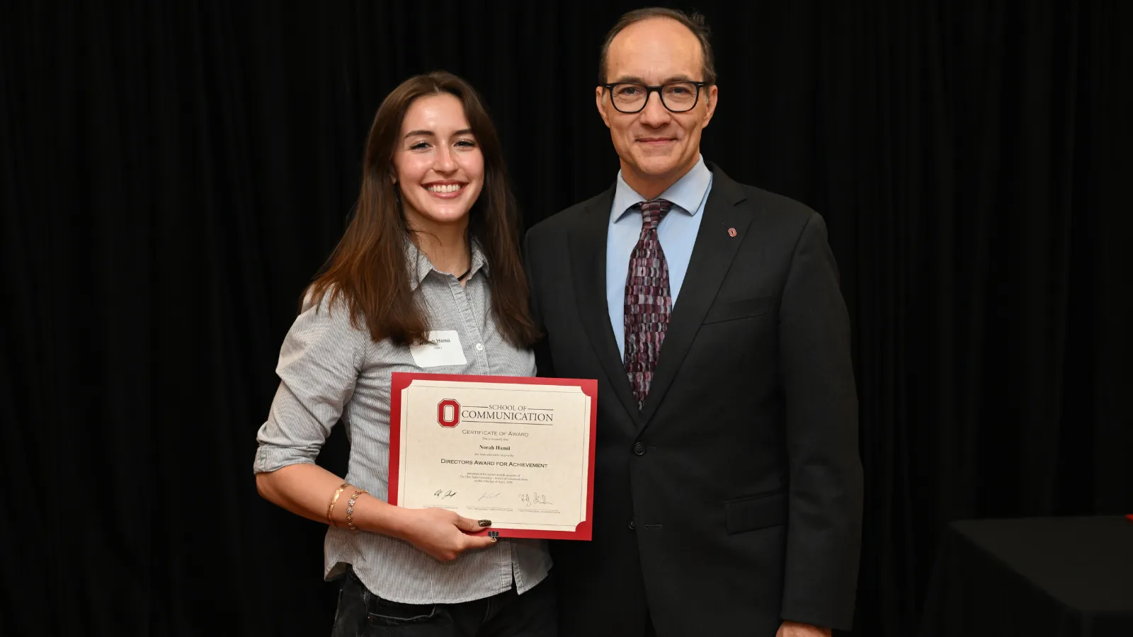 Student and teacher at banquet