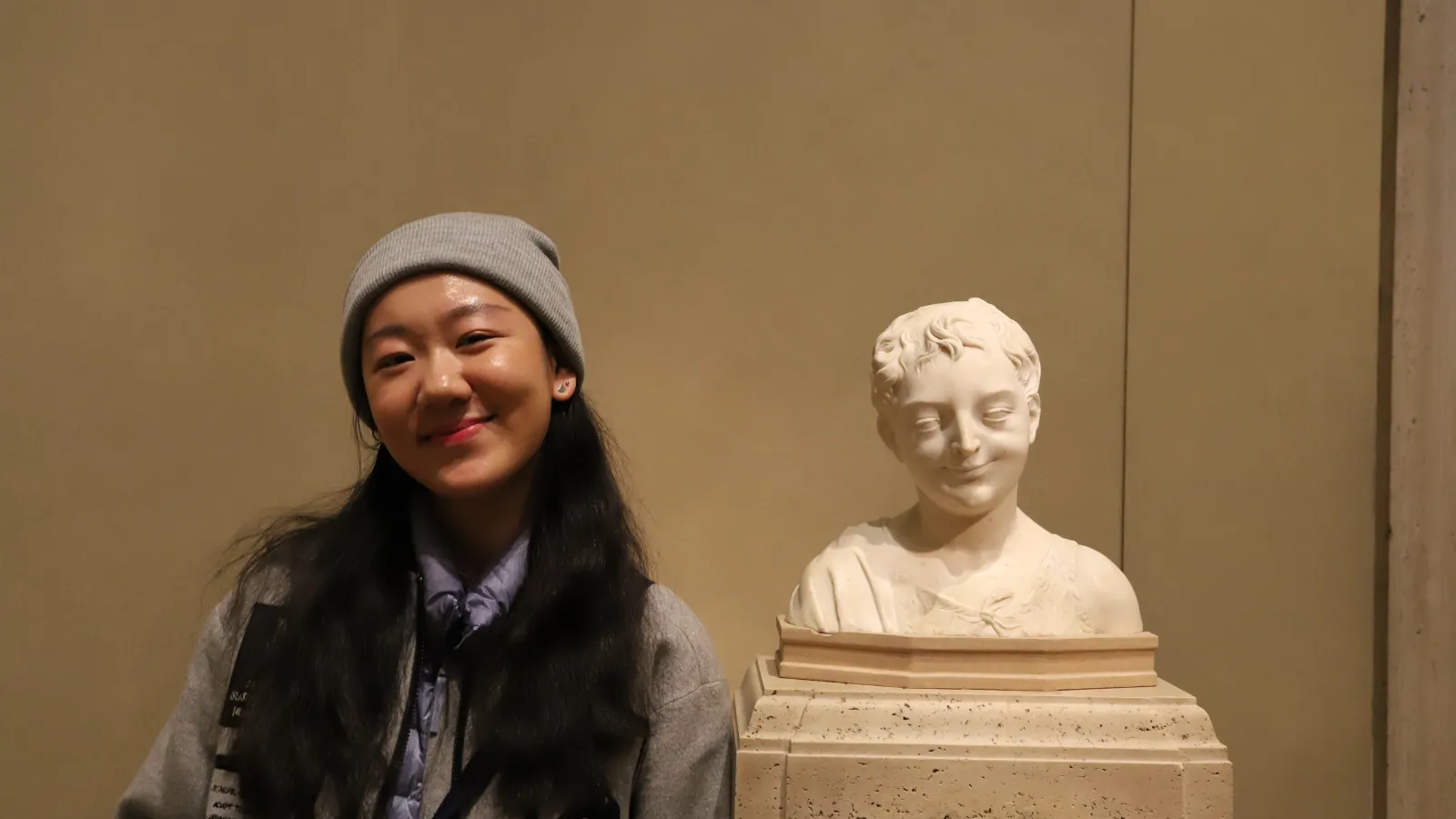 Tracy Zhang Poses with Bust