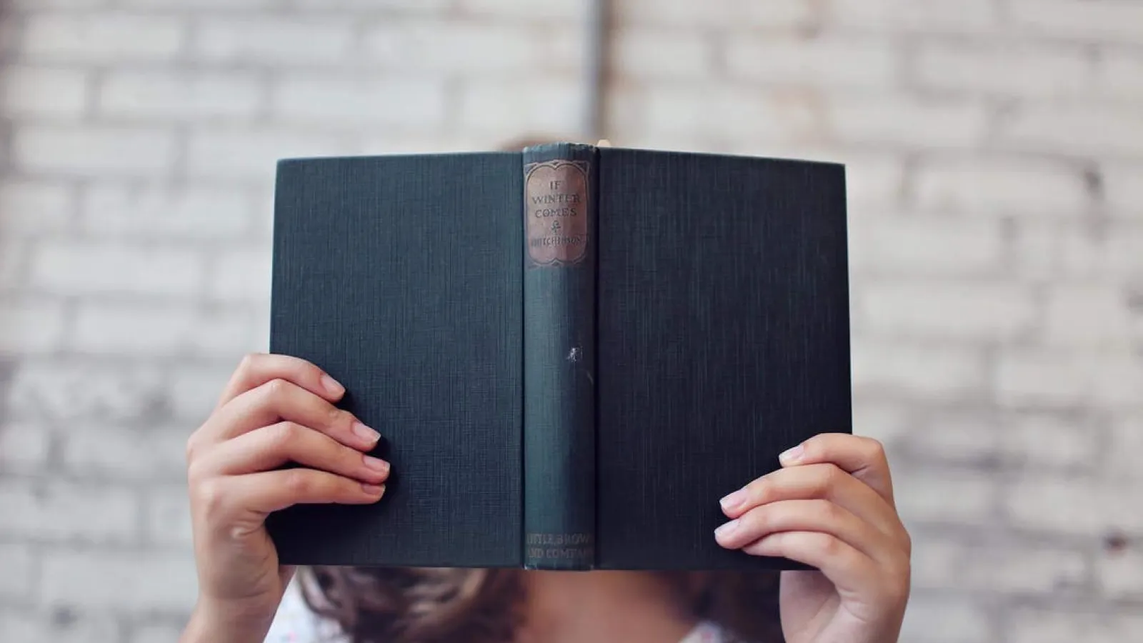 Person reading a book