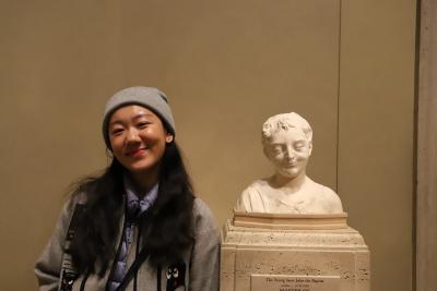 Tracy Zhang Poses with Bust