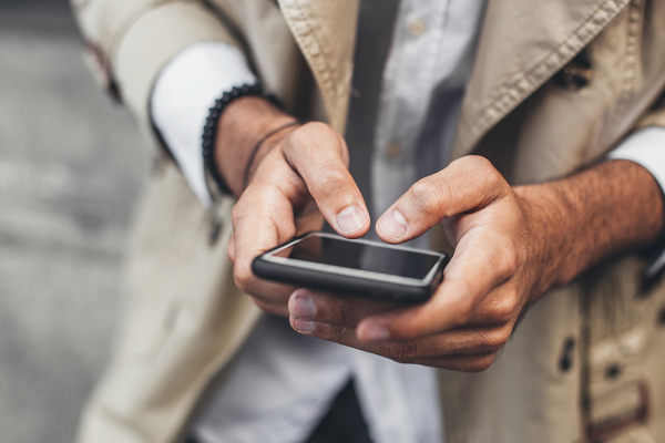 A man holding a smart phone smart phone