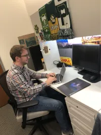 Matthew Sweitzer works on computer